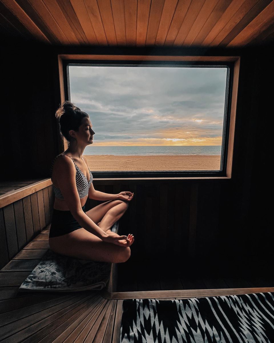 Women in Wooden Sauna at the beach